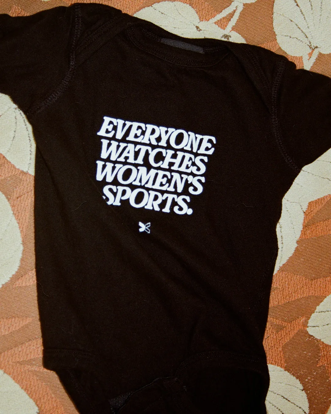 Everyone Watches Women’s Sports™ Snapsuit